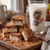 Toffee crumble fudge squares beside a Uranus General Store milk glass with the Uranus mascot
