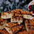Butterfinger Fudge from Uranus stacked in a pile with Christmas decor
