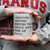 Person holding a white coffee mug with a funny meeting that should have been an email quote.