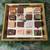 The Big Package Sampler on a serving platter, showcasing the massive 16-flavor variety from the famous Uranus Fudge Factory and General Store.