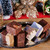 Taste of Uranus sampler pack with six fudge flavors on a holiday silver tray with Christmas decor