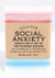 A layered pink, blue, and white novelty bar of Soap for Social Anxiety from Uranus Fudge Factory