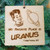 A laser engraved wooden ornament hanging holiday Christmas tree ornament souvenir from Uranus Fudge Factory