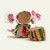 Three wrapped Hot Chocolate saltwater taffy candies stacked together on a plain white background by Uranus Fudge Factory.