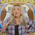 Woman with funny Hillbilly Nut Scratcher wooden novelty gag gift.