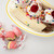 Classic banana split dessert served next to matching tricolor salt water taffy.