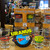 Uranus Missouri planet space logo sticker displayed with glass shot cups from Uranus Fudge Factory
