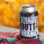 Tie-dye can cooler with a beverage on a table with an autumn background by Uranus Fudge Factory.