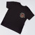 Front of a black kids t-shirt with a small Uranus Crop Dusters chest logo from Uranus Fudge Factory.