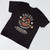 Back of a black kids t-shirt featuring a large Uranus Crop Dusters airplane graphic from Uranus Fudge Factory.