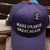 Rex Uranus mascot hat pin attached to a navy Make Uranus Great Again cap from Uranus Fudge Factory.