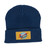 Navy blue ribbed knit winter beanie hat with rectangular rocket logo patch from Uranus Fudge Factory.