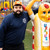Man wearing a navy blue Uranus Fire Dept. sweatshirt next to a hot dog statue at Uranus Fudge Factory.