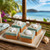 Life's a Beach fudge squares on a ceramic tray with a tropical beach and palm trees in the background