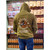 Back view of a person wearing the olive green Uranus Crop Dusters zip-up hoodie with the hood pulled up, displaying the large vintage biplane graphic.