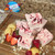 Gourmet Strawberry Shortcake fudge pieces garnished with berries and cookies from Uranus Fudge Factory