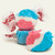 Three pieces of red, white and blue salt water taffy candies wrapped in wax paper.