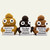 Yellow, dark brown, and light brown Emotional Support Poop crochet stuffies holding Uranus Fudge Factory signs in a row