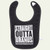 Smiling baby in a high chair wearing the black Straight Outta Uranus bib with white block lettering