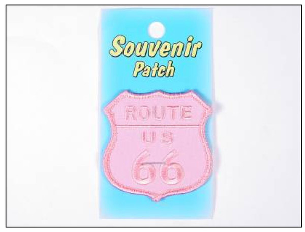 An embroidered light pink Route US 66 highway shield souvenir patch on a light blue display card