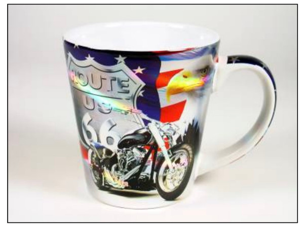 A white ceramic souvenir mug featuring a motorcycle, a Route US 66 shield, a bald eagle, and an American flag design