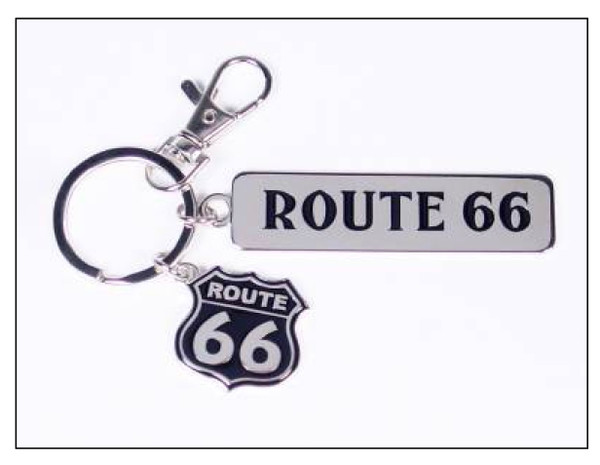 A silver metal Route 66 souvenir keychain featuring a rectangular logo bar and a hanging highway shield charm