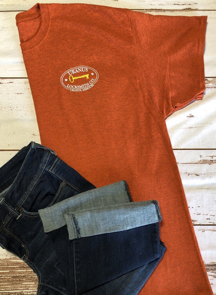 Orange Uranus Locksmith Co novelty t-shirt styled with jeans from Uranus Missouri