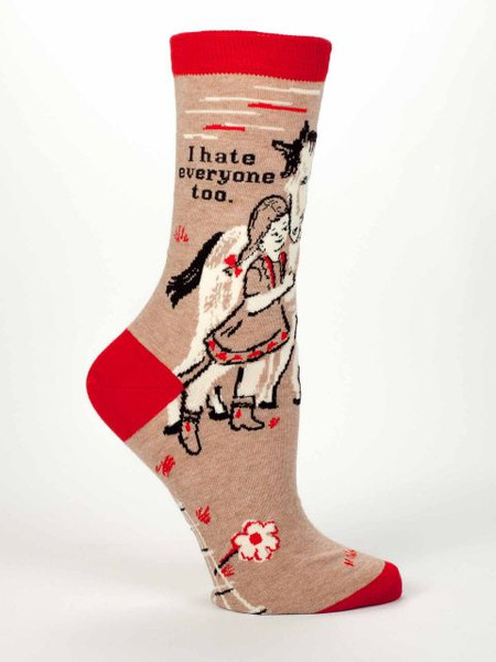 A tan novelty crew sock with a red cuff and heel featuring a girl hugging a horse with the text "I hate everyone too."