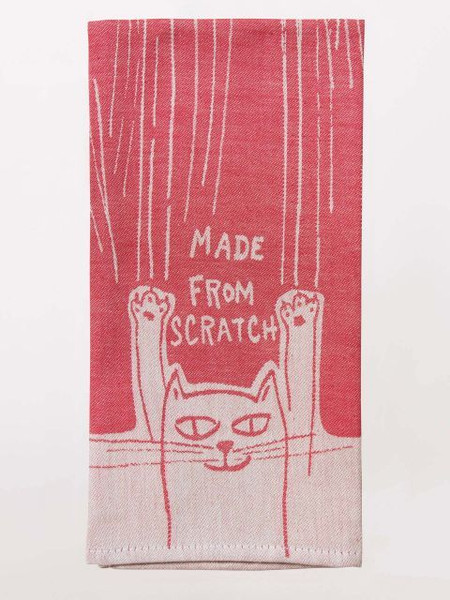 Folded pink dish towel featuring a scratching cat and Made From Scratch text.