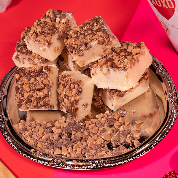 Toffee fudge from Uranus crumbles on a silver platter 