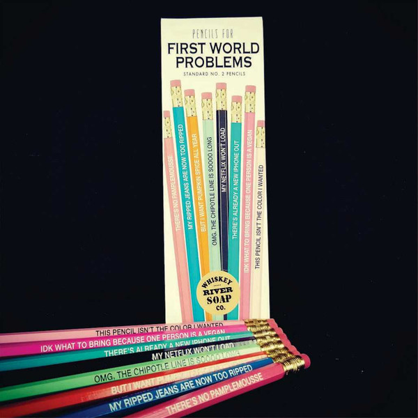 Packaged set of colorful Pencils for First World Problems next to loose pencils.