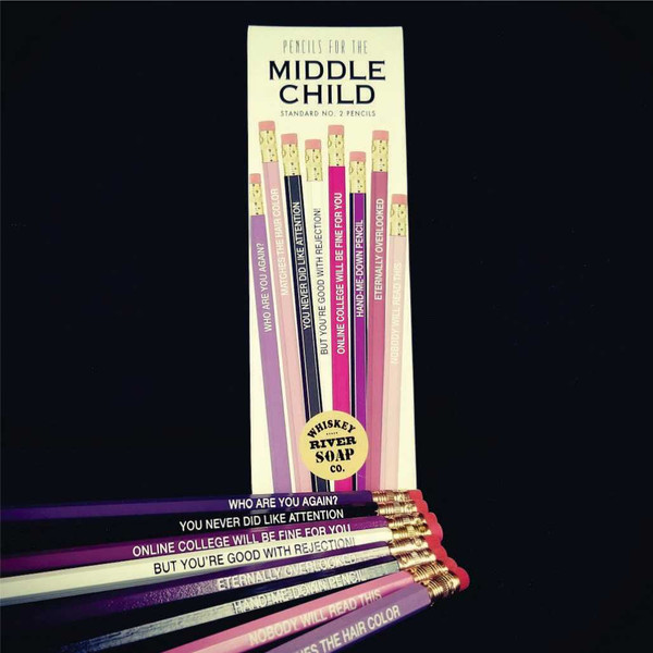 Packaged set of purple Pencils for the Middle Child next to loose pencils.