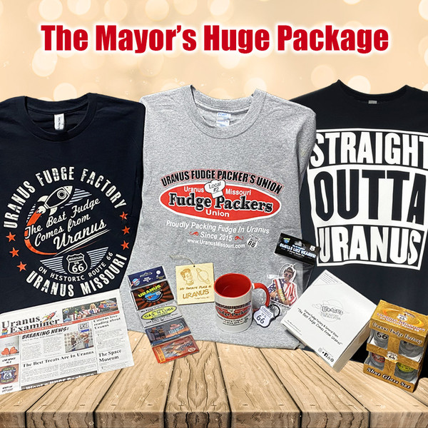 The Mayor's Huge Package holiday souvenir gift bundle layout featuring apparel and snacks from Uranus Fudge Factory