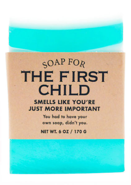 White and blue bar of soap for The First Child package with a funny text label.