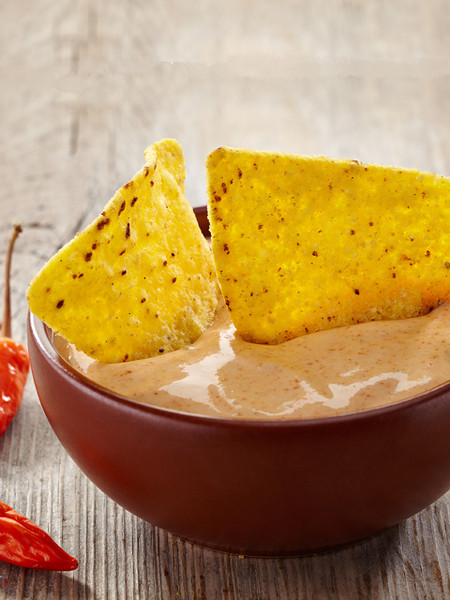 Zesty Uranus Farms Bueno Taco Dip Mix prepared in a bowl, a great party snack from the Uranus Fudge Factory.