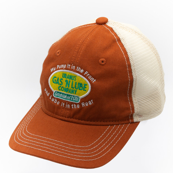 Angled view of burnt orange trucker hat with Gas N Lube embroidered logo from Uranus Fudge Factory.