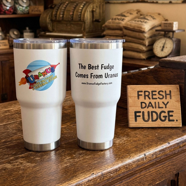 White Uranus Fudge Factory stainless steel tumbler with logo and “The Best Fudge Comes From Uranus” slogan on clean white background.