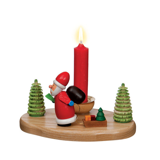 Santa pulling a sled candleholder