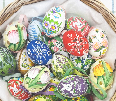 Basket full of hand-painted delicate osterbaum easter eggs