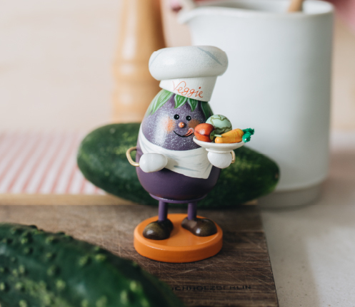 Eggplant chef incense smoker with a happy smile