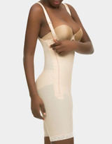 Mid-thigh length compression garment featuring adjustable shoulder straps and breathable, latex-free fabric. Mid-thigh length compression garment featuring adjustable shoulder straps and breathable, latex-free fabric.
