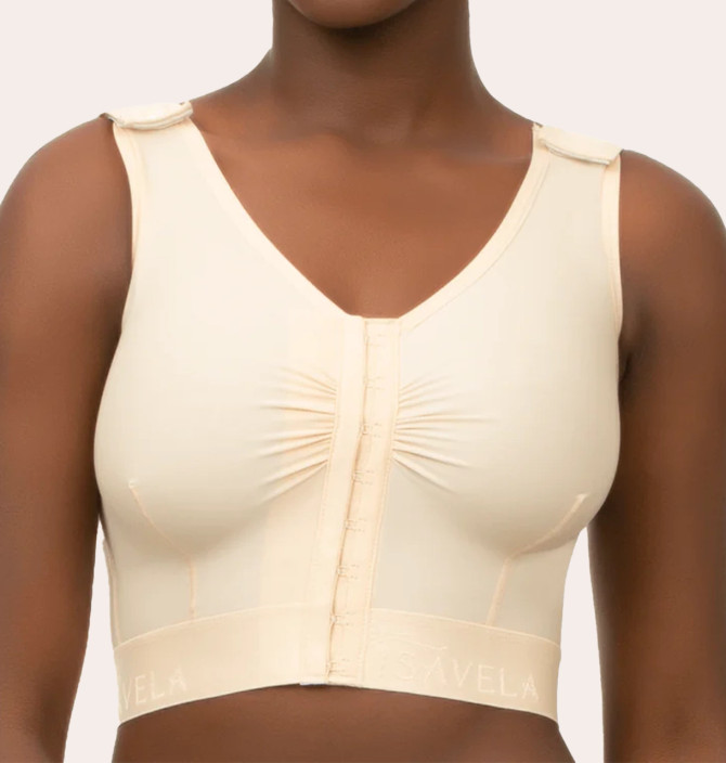 Sleeveless compression vest with 2-inch plush underbust elastic for enhanced support and stabilisation after breast surgery.
