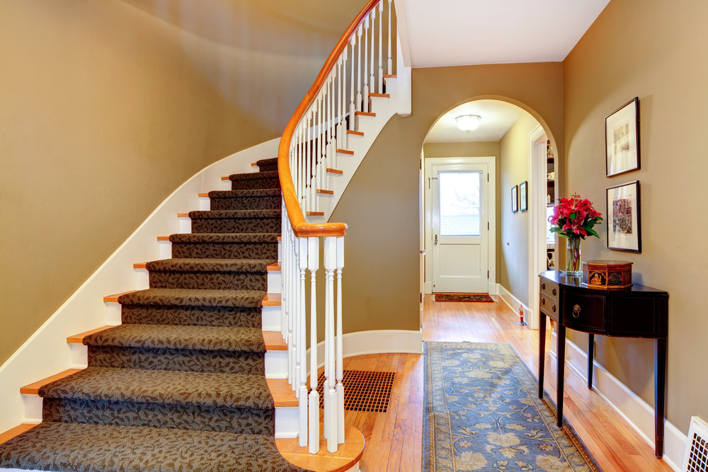 The Art of Layering Rugs & Stair Runners