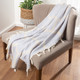 LR Home Avery 80297 Lilac White Throw