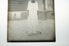 Antique 5x7 Inch Plate Glass Negative Of A Woman Standing In Backyard V32