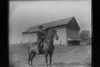 Antique 4x5 Inch Plate Glass Negative Of A Man On A Horse In front Of A Farm E17