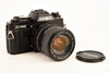 Minolta X-700 35mm SLR Film Camera with Promaster 28-70mm f/2.8 Lens V28