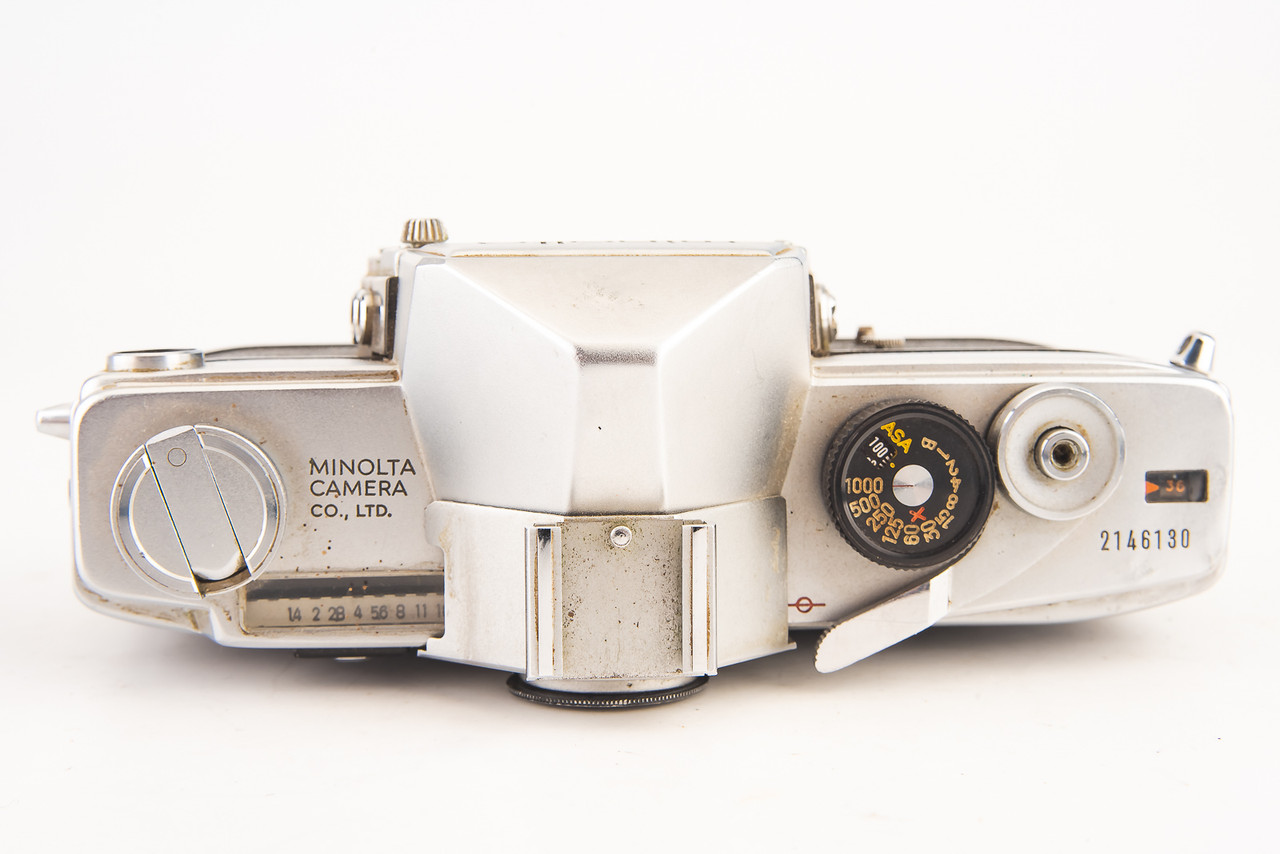 Minolta SR-7 35mm SLR Film Camera Body with Protective Cap Battery