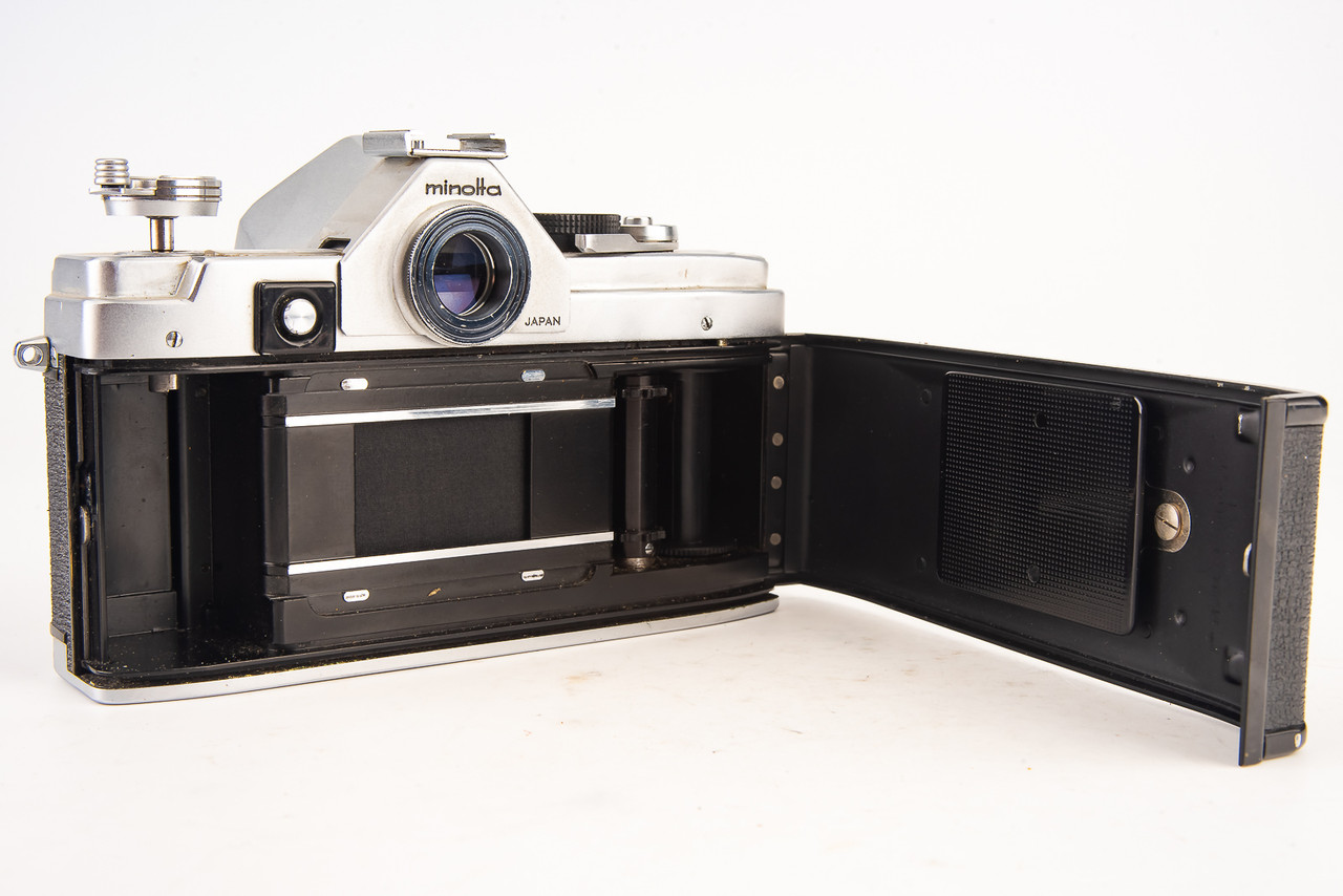 Minolta SR-7 35mm SLR Film Camera Body with Protective Cap Battery