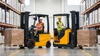 Sit Down Forklifts Vs Stand Up Forklifts: Which Is Right for Your Operation?